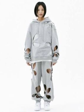Size M like new nibgnus flower cutout joggers designer